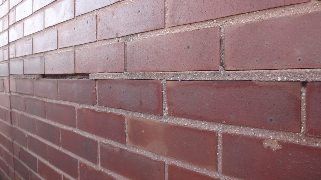 From Mass Masonry to Veneer: The Evolution of Cavity Wall Design